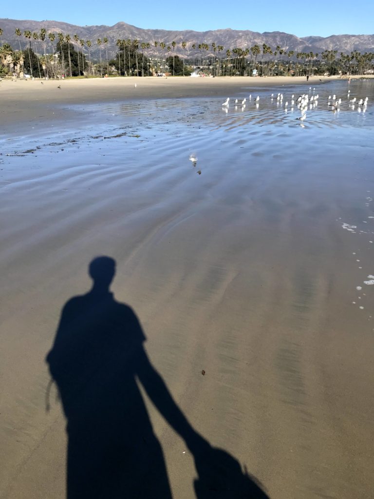 my shadow on the beach